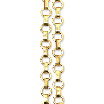 Close-up detail shot of two gold chunky round link rolo chains showing chain texture and links on a white background