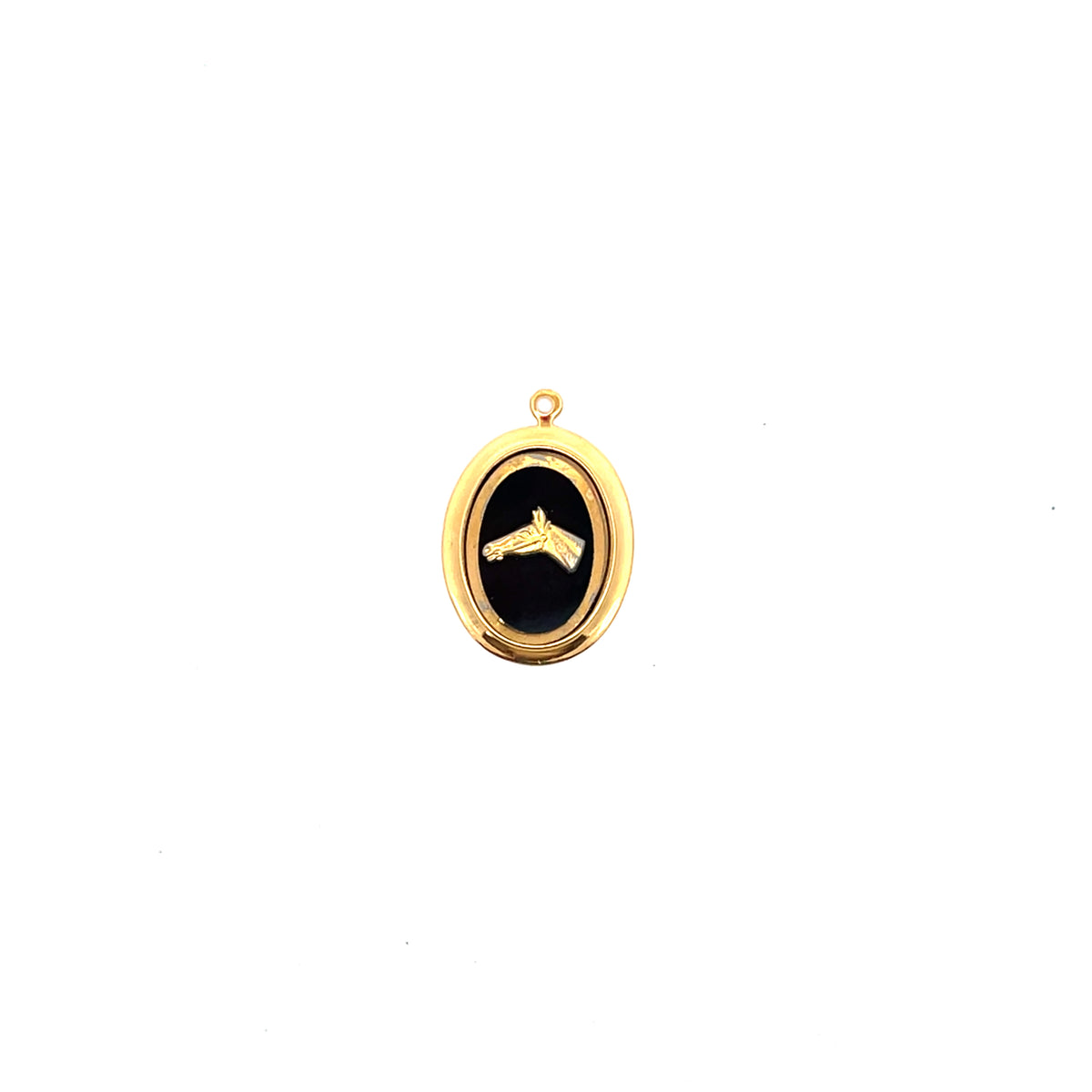 Gold pendant with black background on a white background