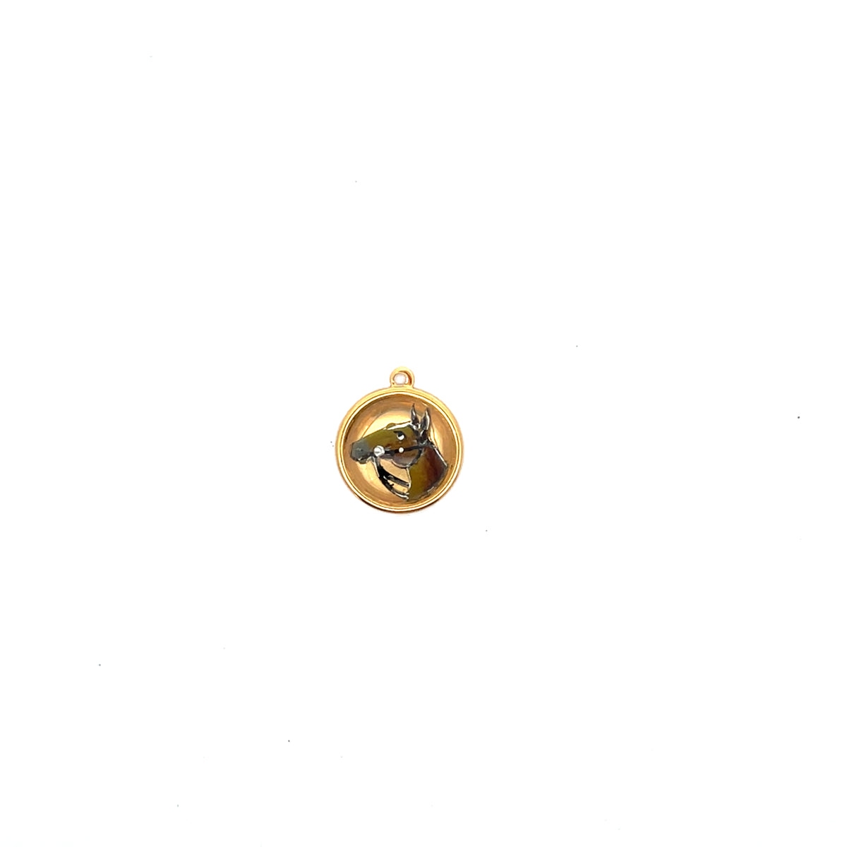 Gold pendant with a bee design on a white background