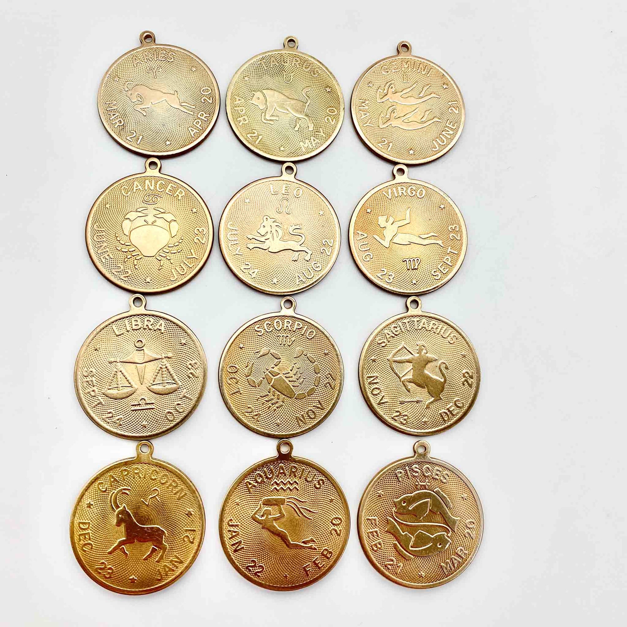 Vintage brass coin zodiac sign set