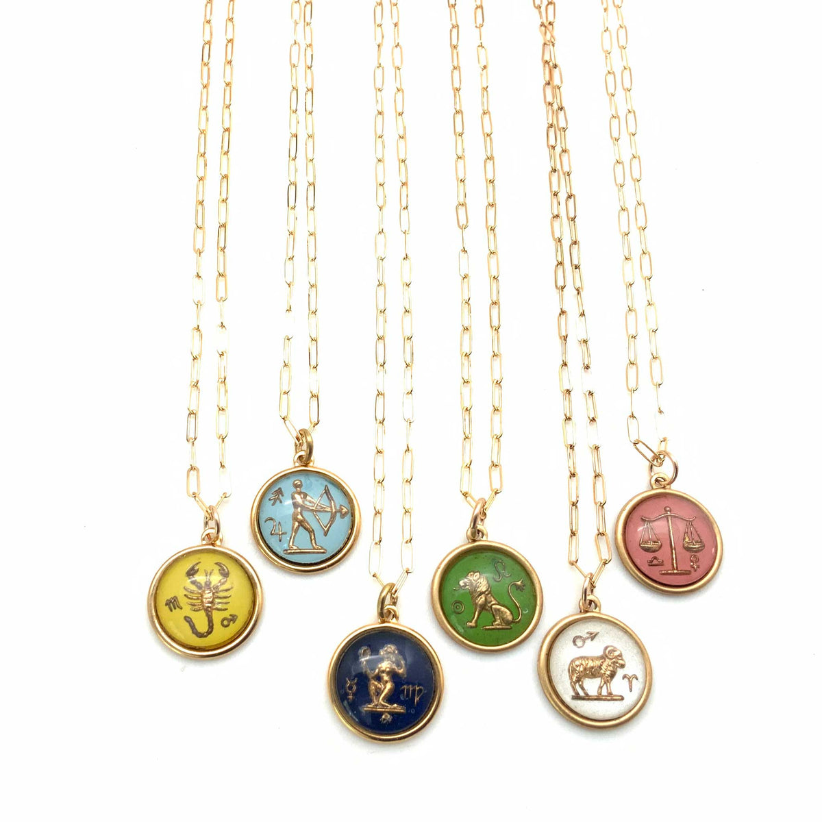 vintage glass necklace with small glass zodiac sign charm